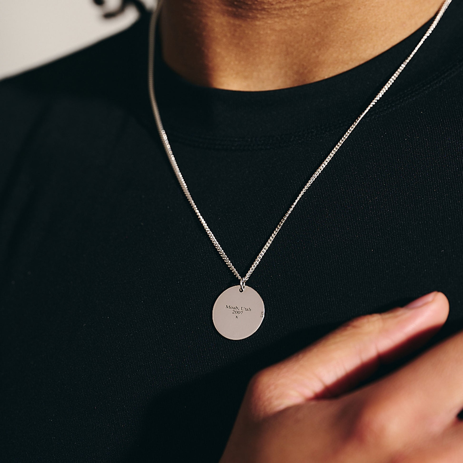 engraved back of place you met necklace star map