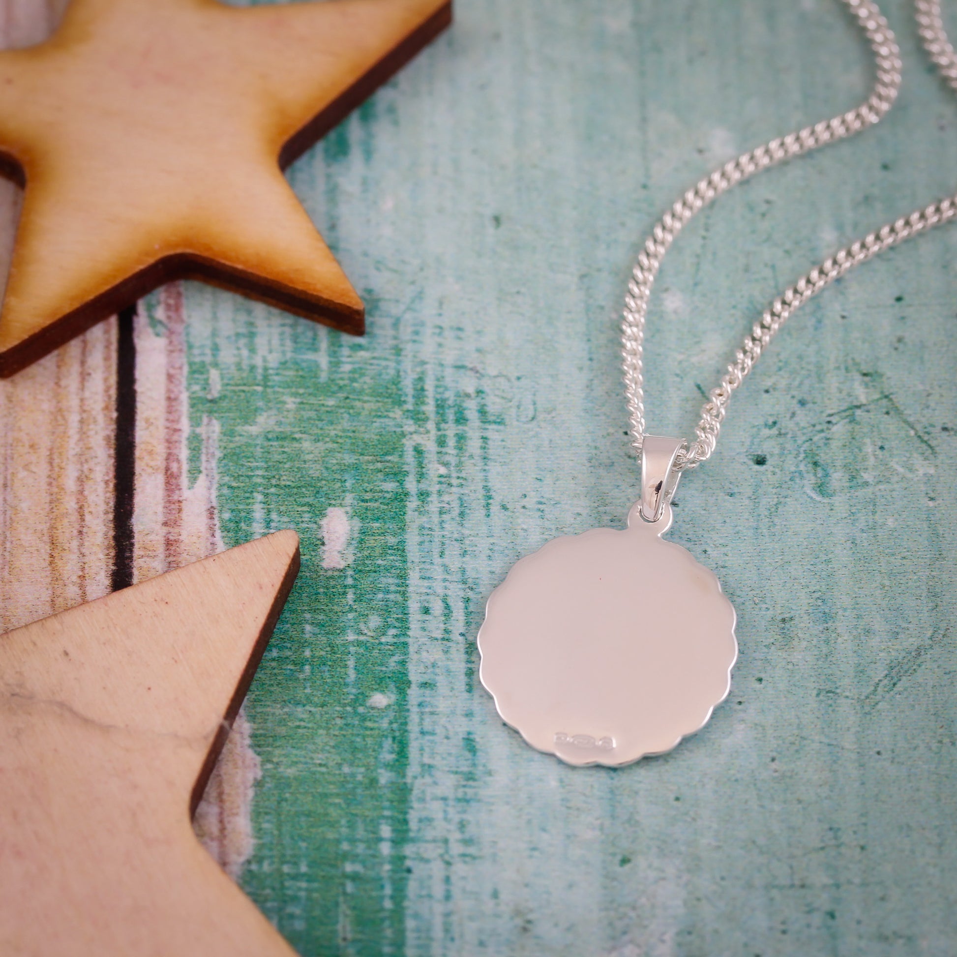 silver ellipse scalloped edge Saint Christopher necklace back without engraving on curb chain