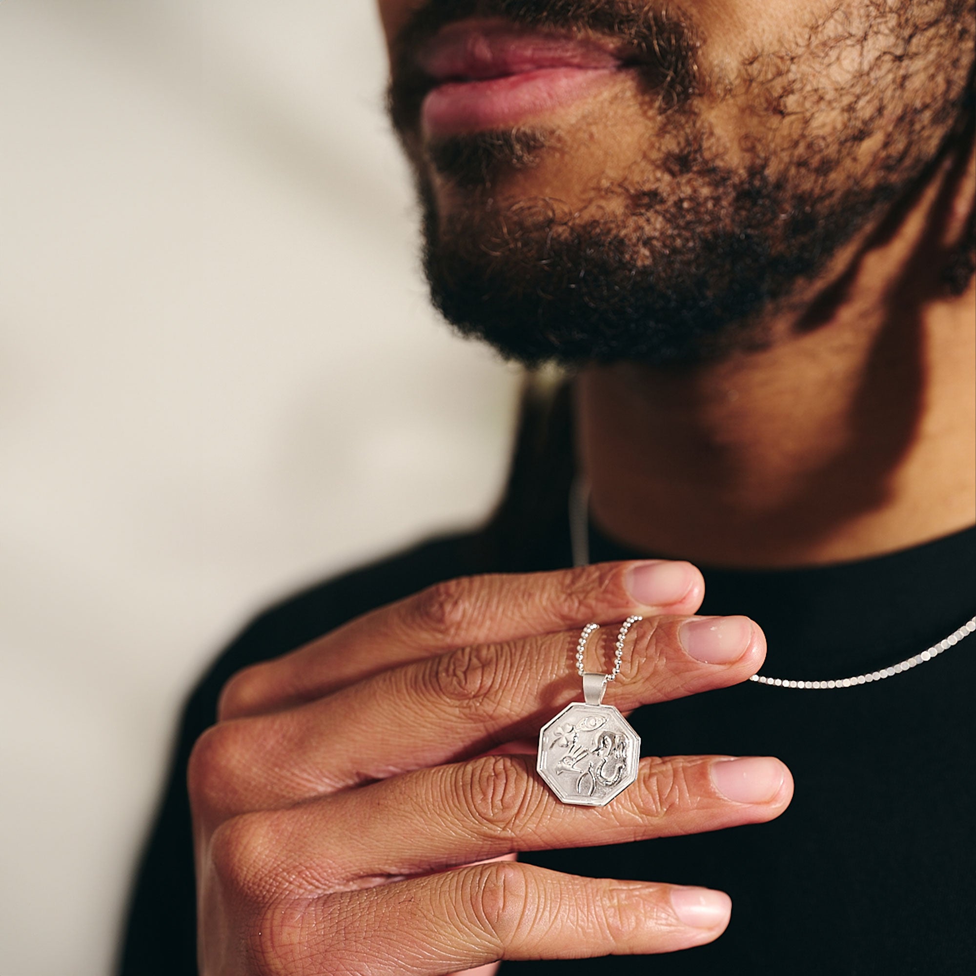 unisex gender neutral good luck necklace with lucky symbols