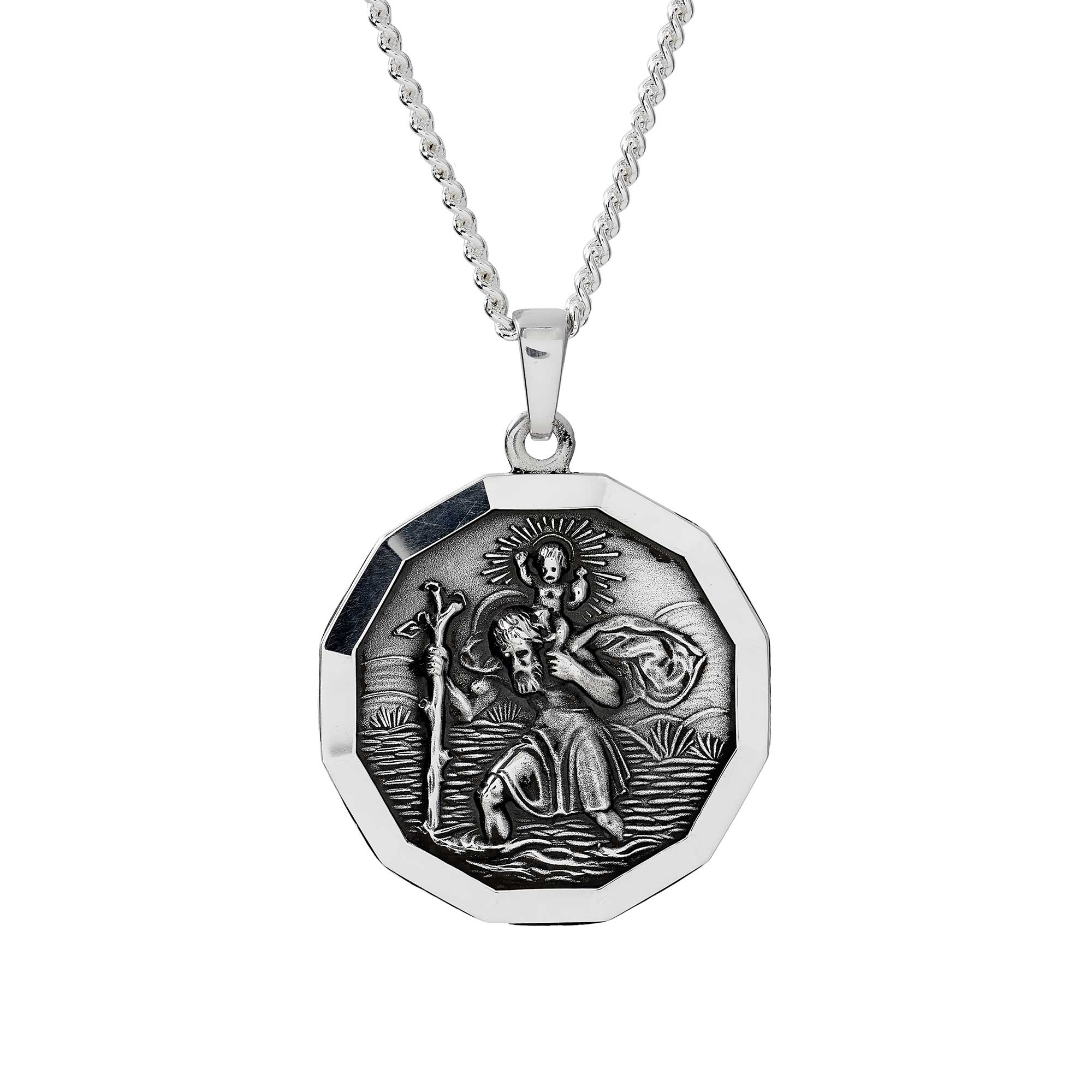 St. Christopher dodecagon pendant in sterling silver with a oxidised finish, hanging on a curb chain.