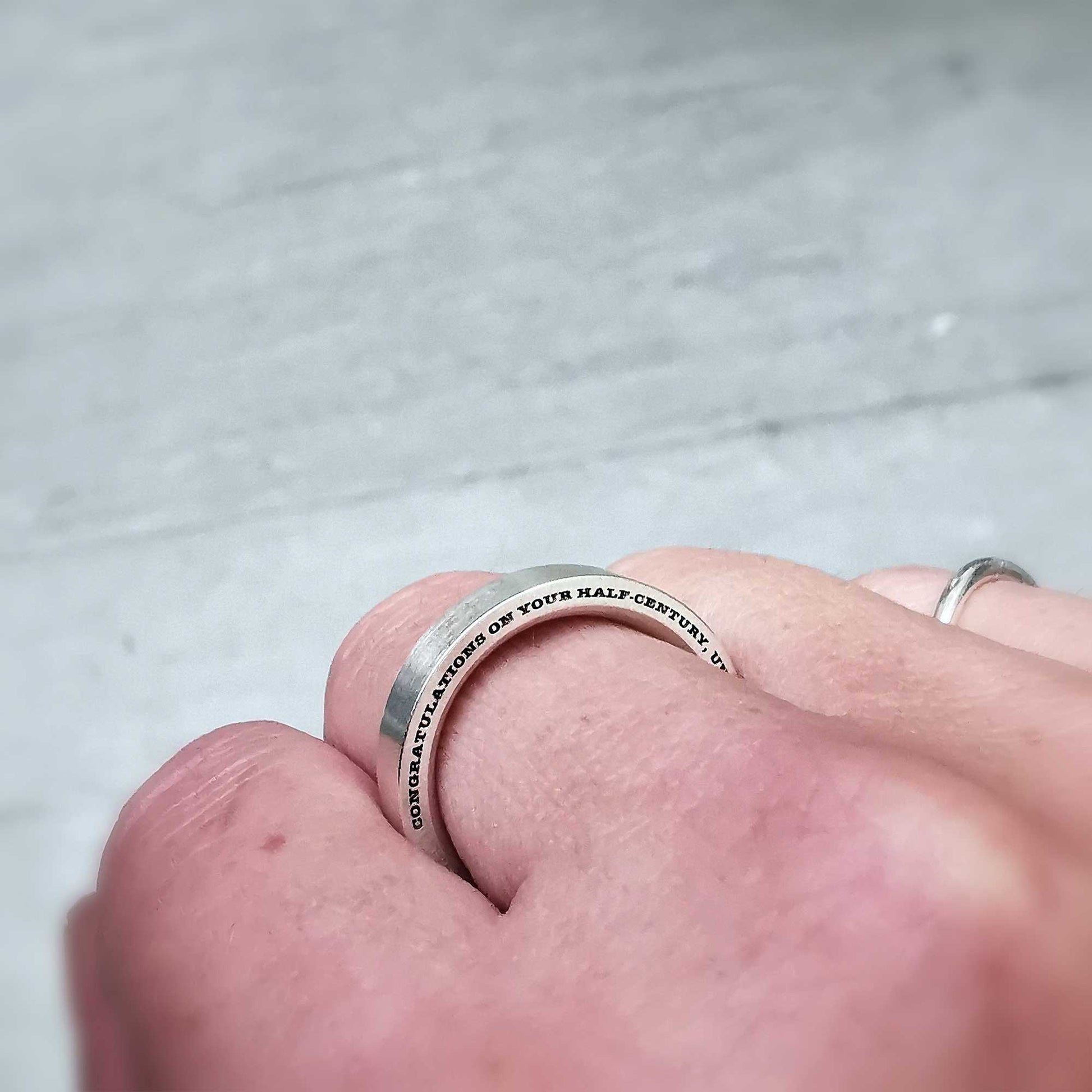 secret message mens personalised ring engraved on edge off the map jewellery