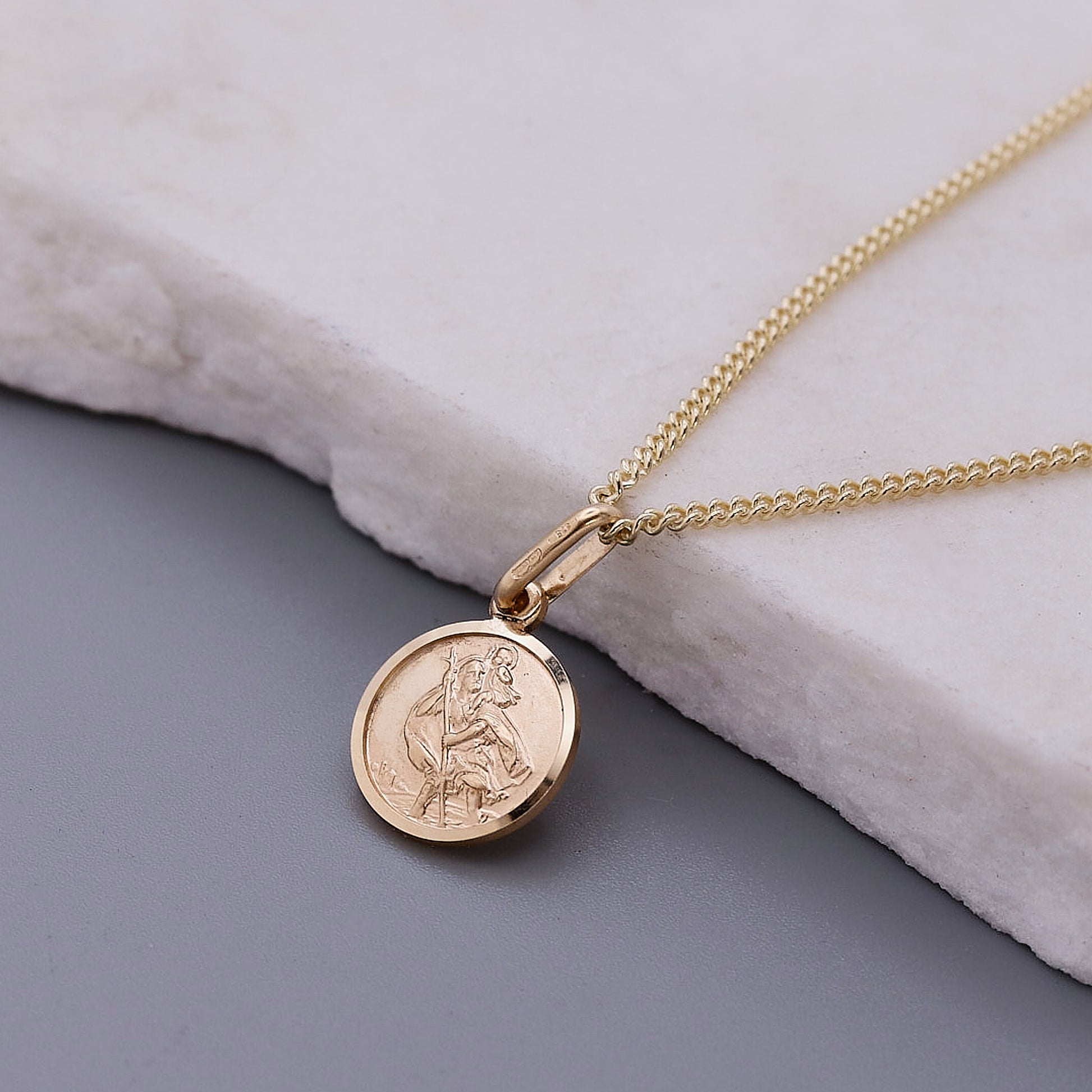 Gold necklace saint christopher on a curb chain