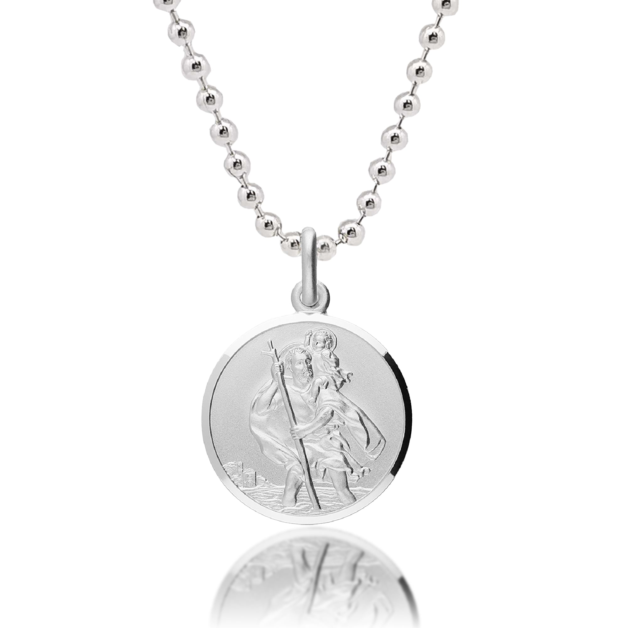 Silver necklace with a round pendant featuring an engraved design on a white background