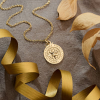 solid gold 20mm compass necklace travel safe on  2mm open trace chain