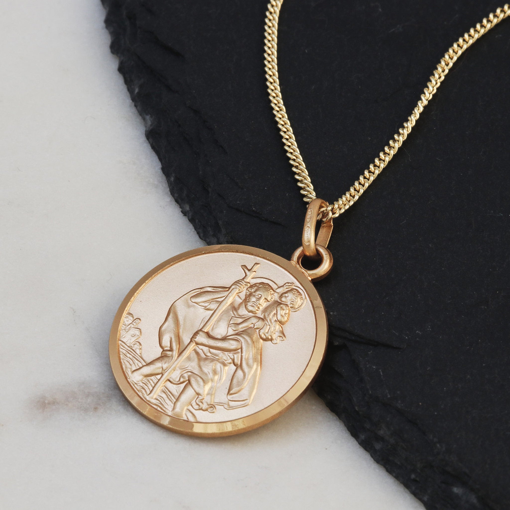 22mm wide 9k gold St Christopher necklace with a round pendant on heavier gold curb chain