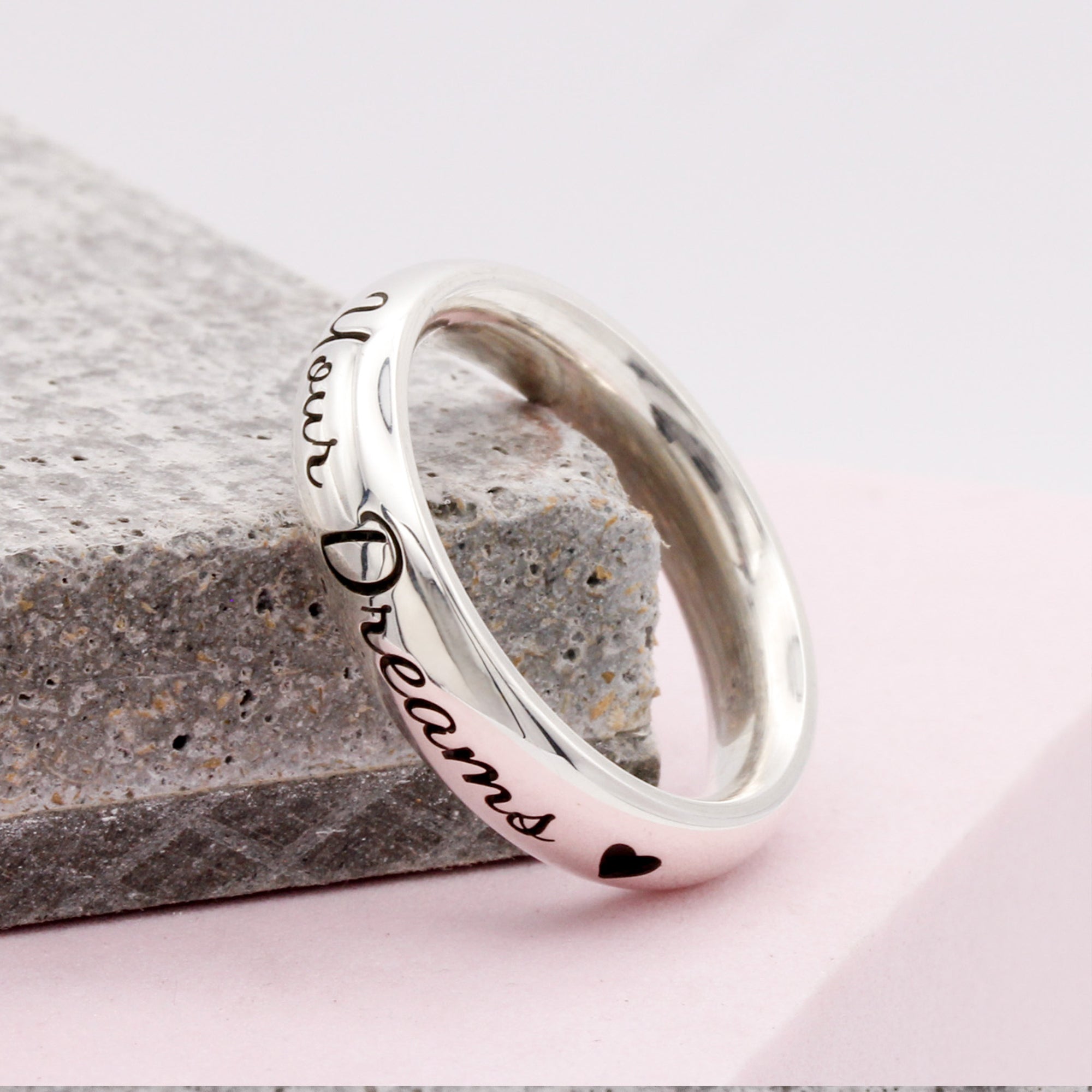 chunky 5mm wide personalized silver ring engraved with a message