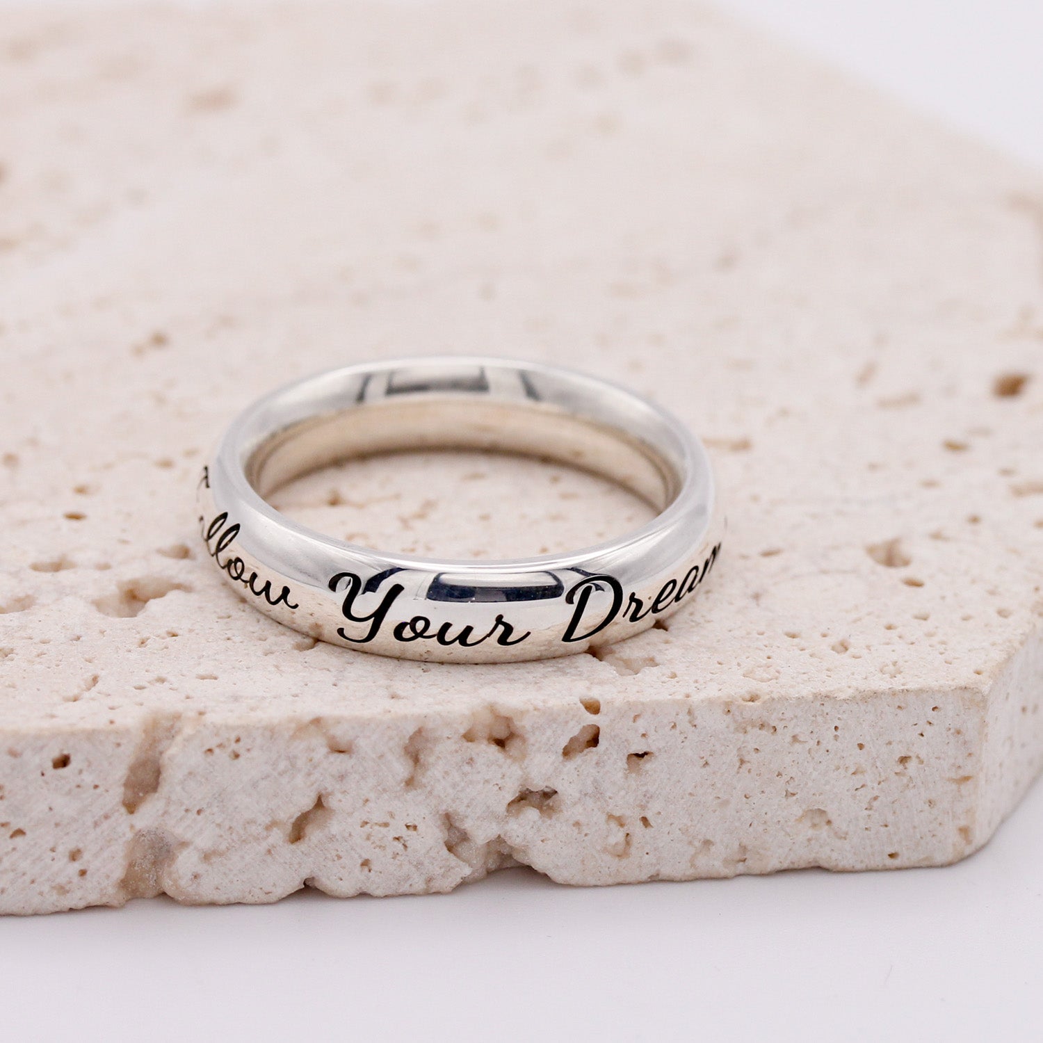 chunky 5mm wide personalized silver ring engraved with a message