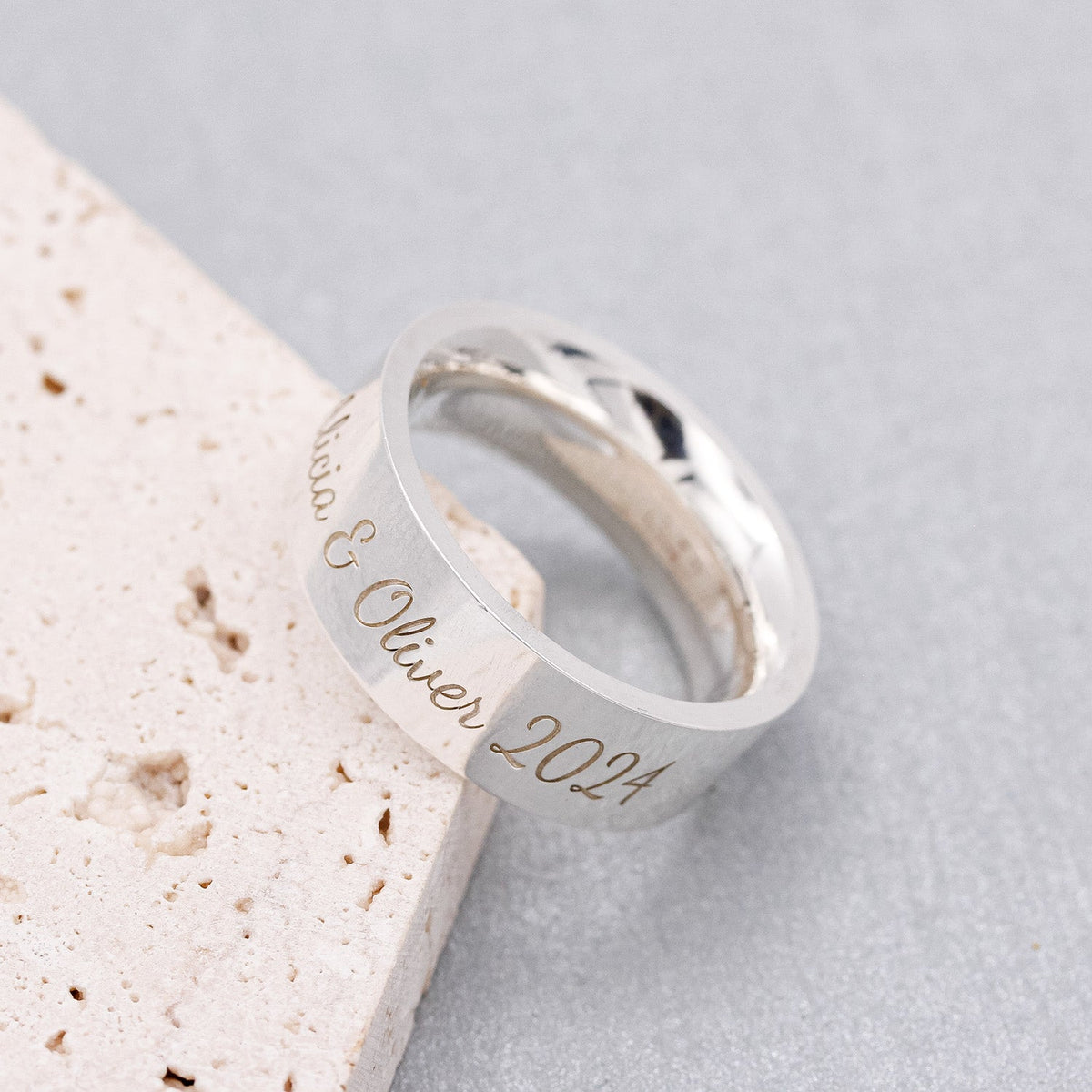 personalised wide mens silver ring engraved with message in script font