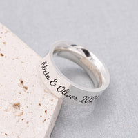 personalised wide mens silver ring engraved with message in script font