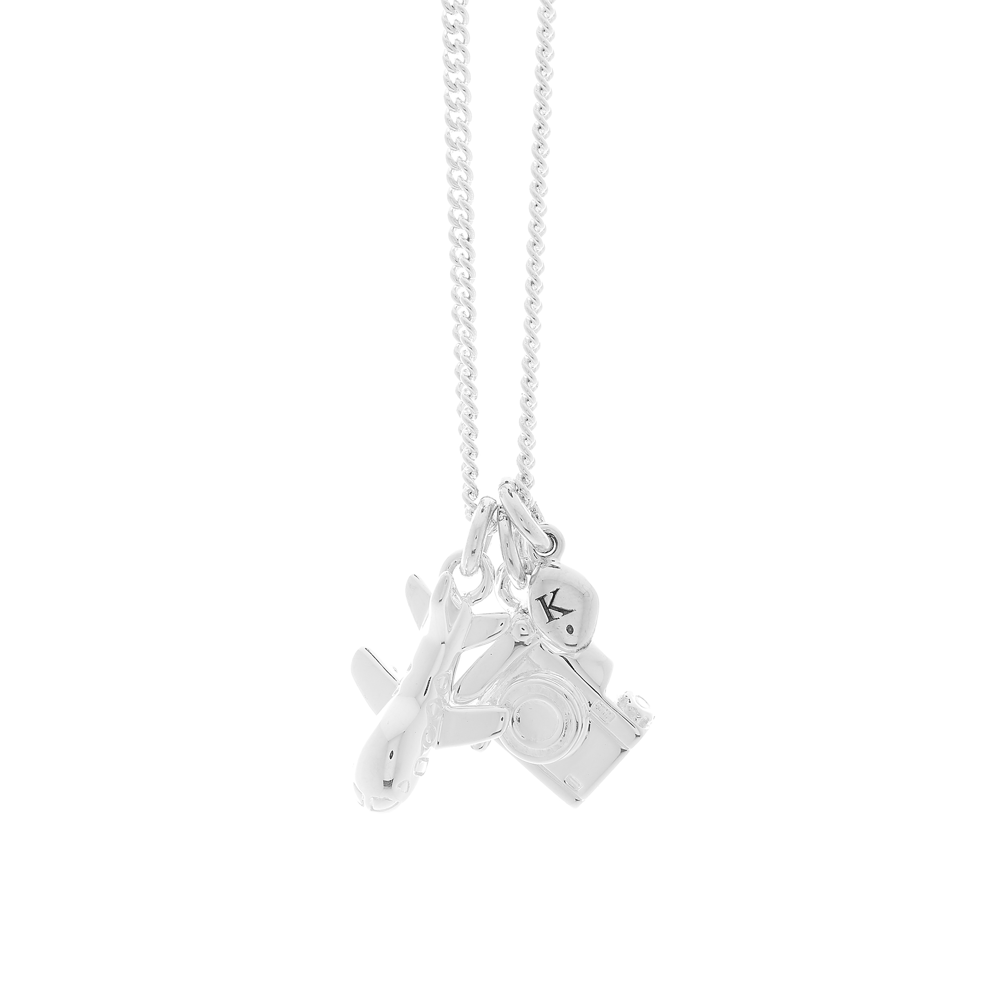 Silver necklace with aeroplane camera and pebble charms