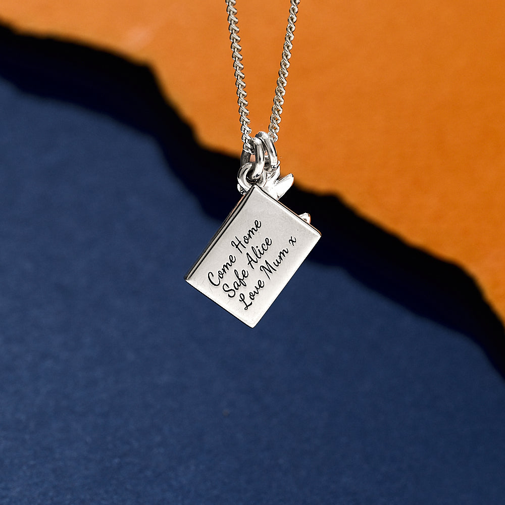 Silver necklace with aeroplane and engraved postcard pendants travel jewellery from off the map