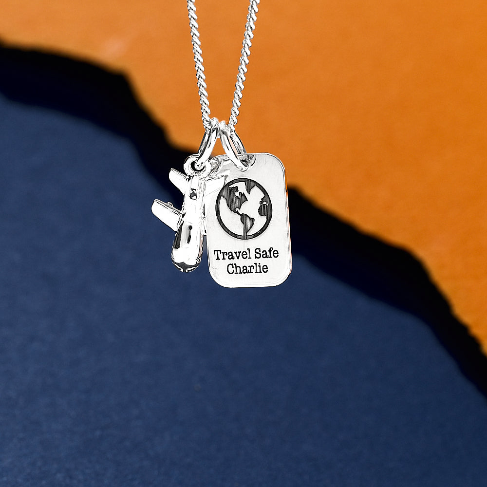 Silver aeroplane and dog tag travel necklace on curb chain Off The Map Jewellery