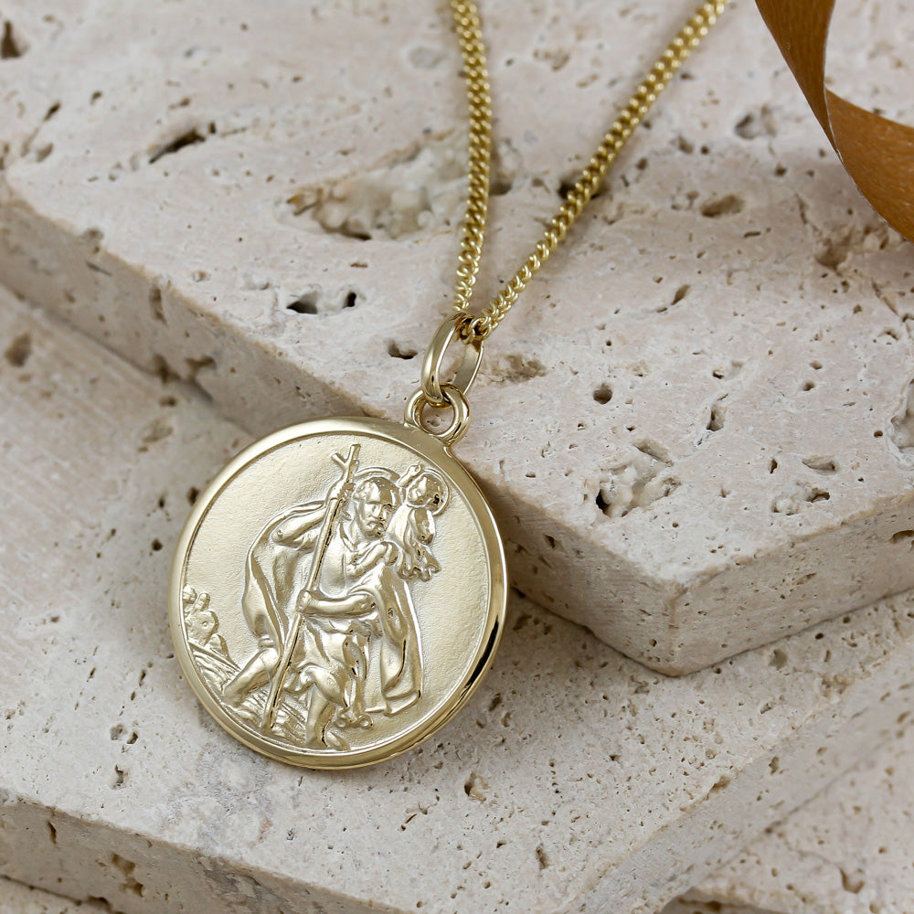 solid gold saint christopher necklace on light curb chain 20mm wide