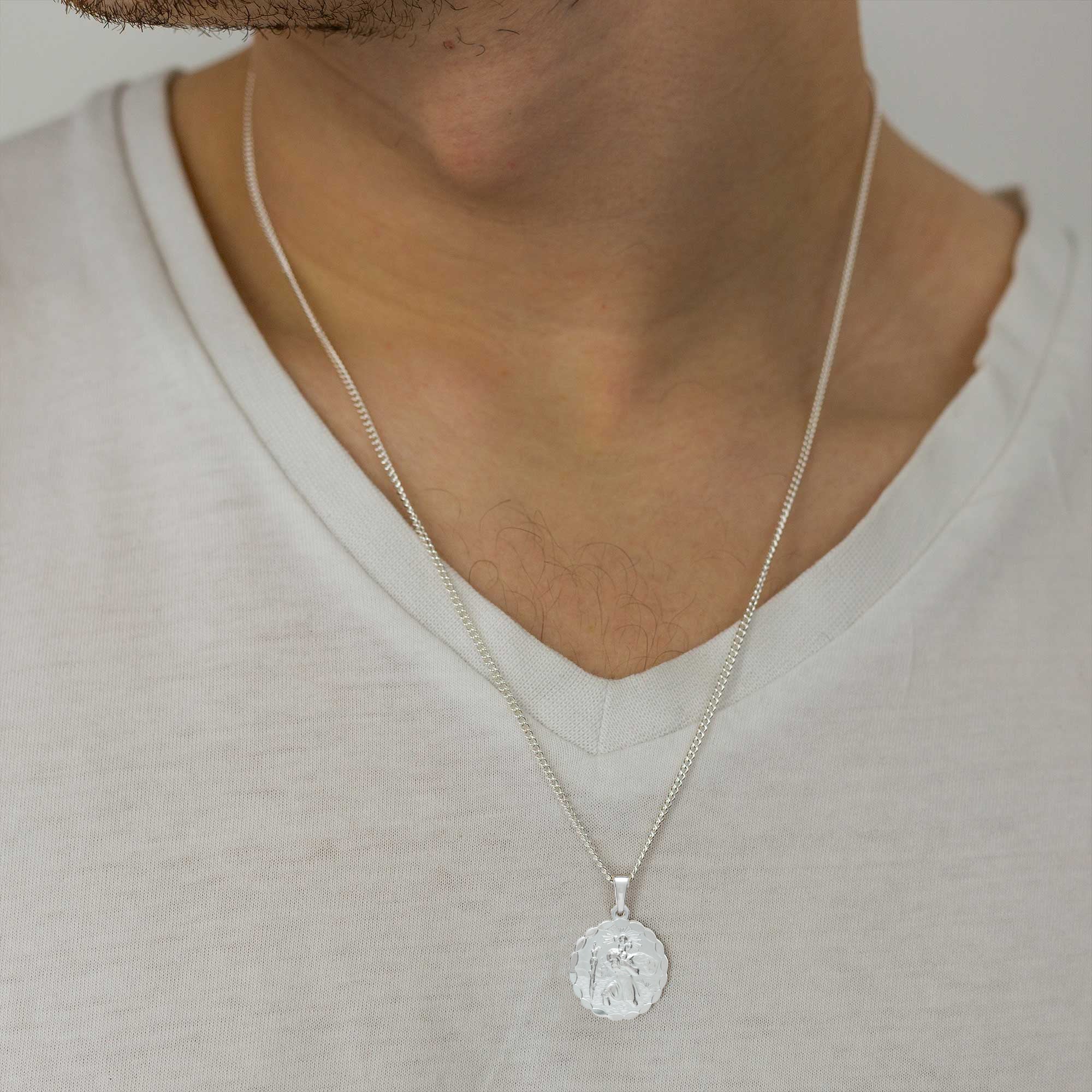 silver ellipse scalloped edge Saint Christopher necklace on curb chain