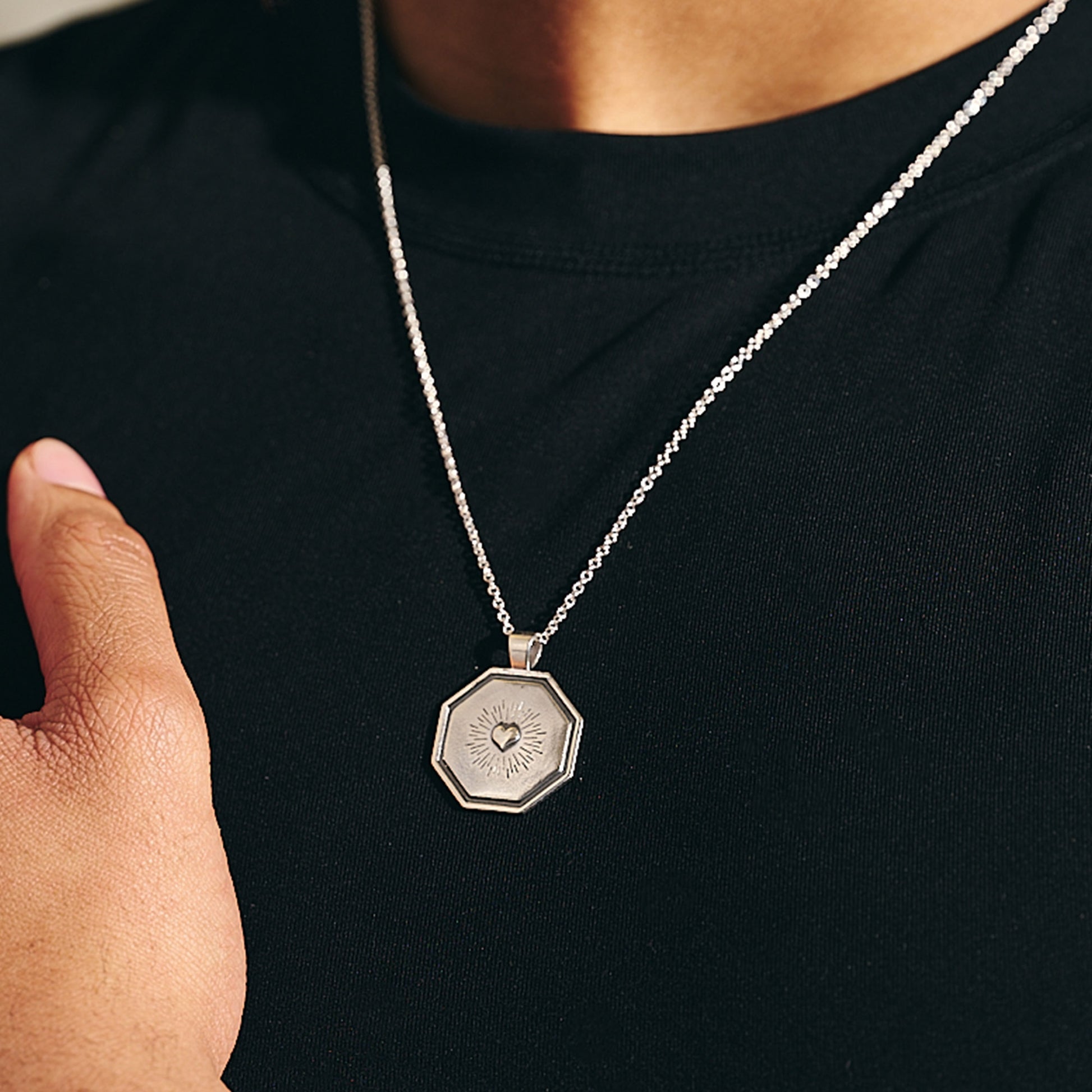 raised heart octagon pendant with sacred heart style detailing