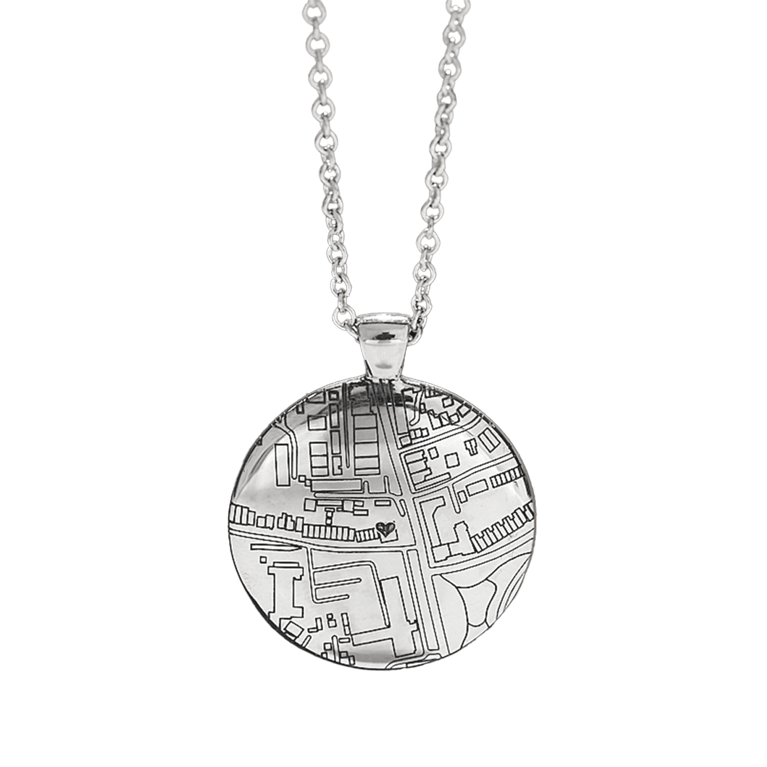 Silver necklace with a round pendant featuring a detailed map design on a white background