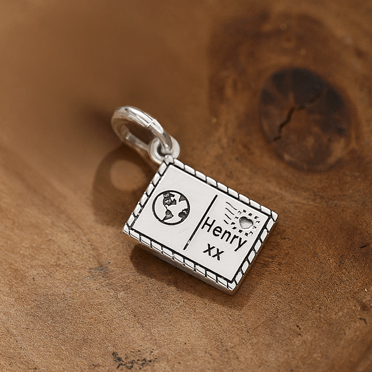 Silver postcard with personalised name and symbols by Off The Map Jewellery