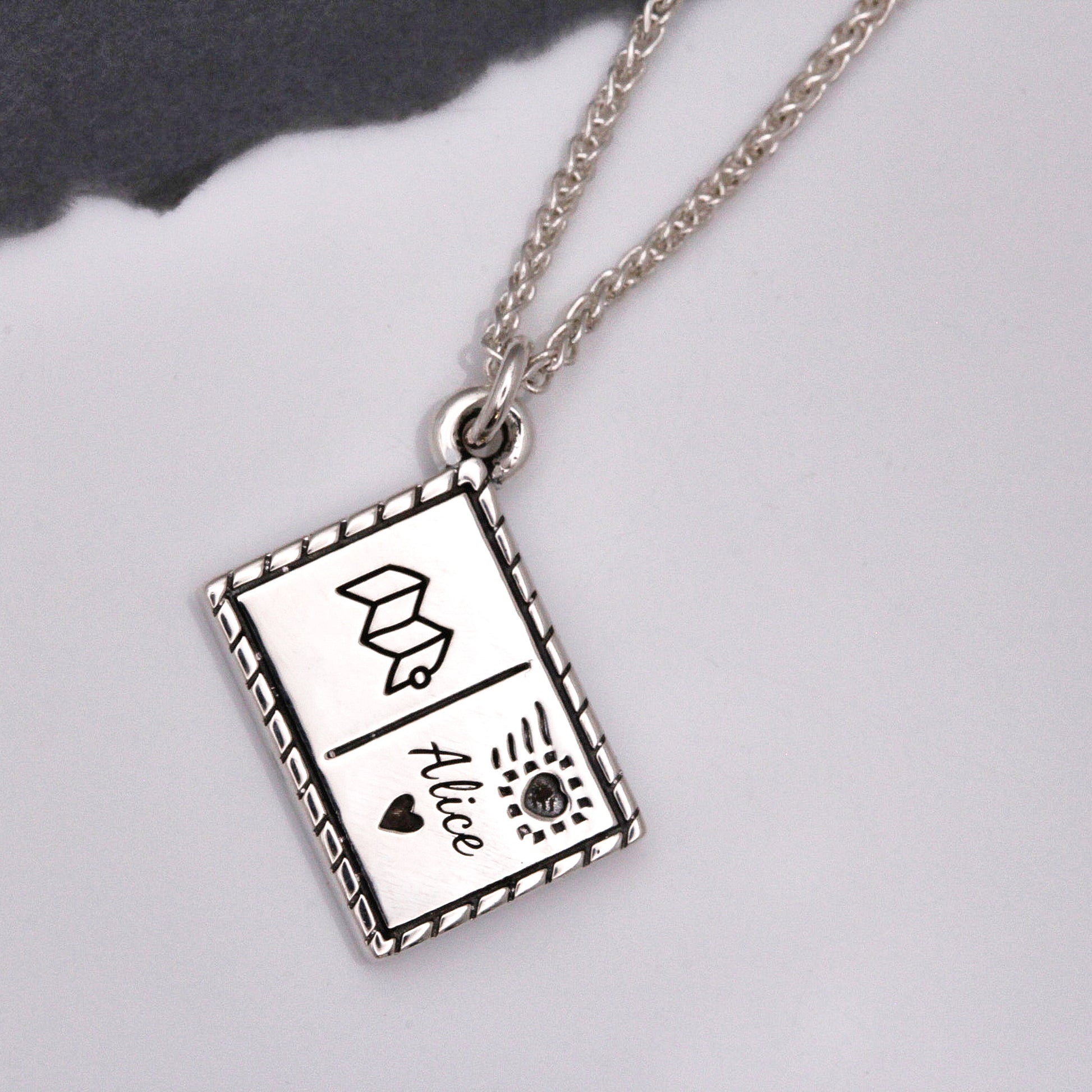 Silver postcard with personalised name and symbols by Off The Map Jewellery necklace