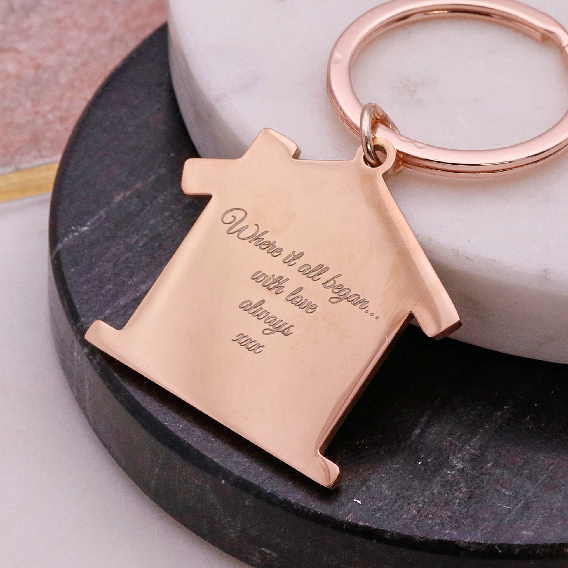 rose gold house shaped silver keyring with engraved message