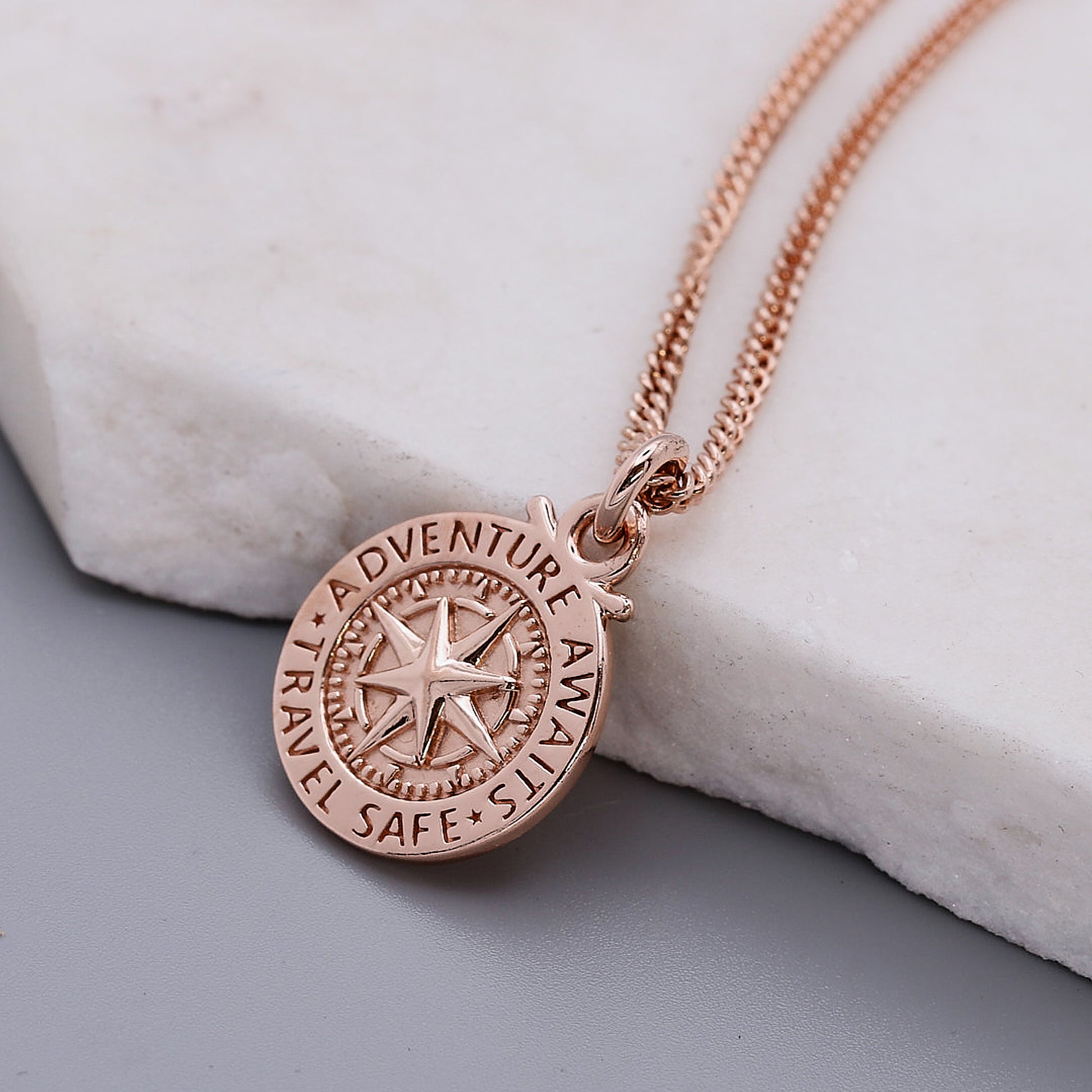 rose gold compass pendant adventure awaits