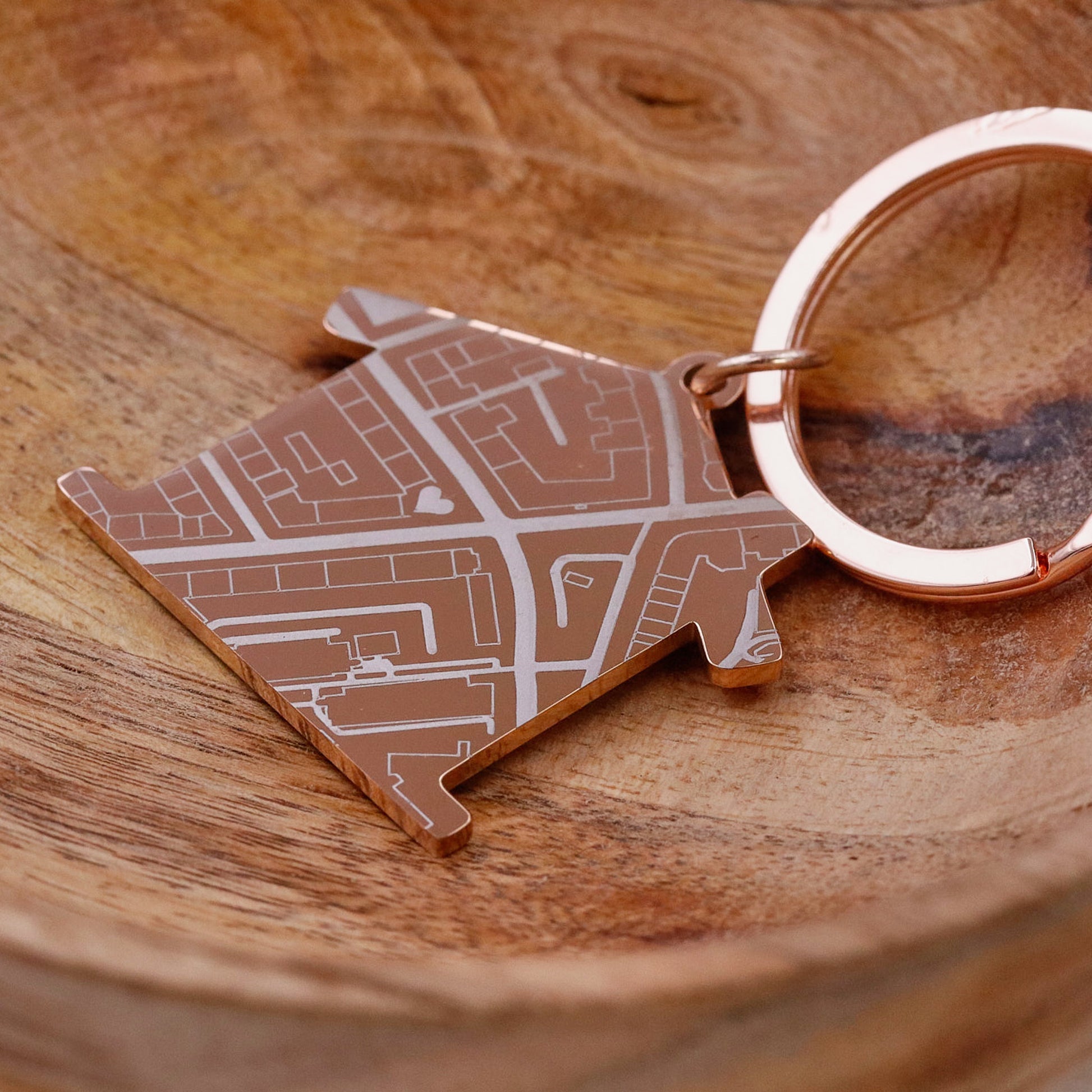 Rose gold house shaped silver keyring with map design