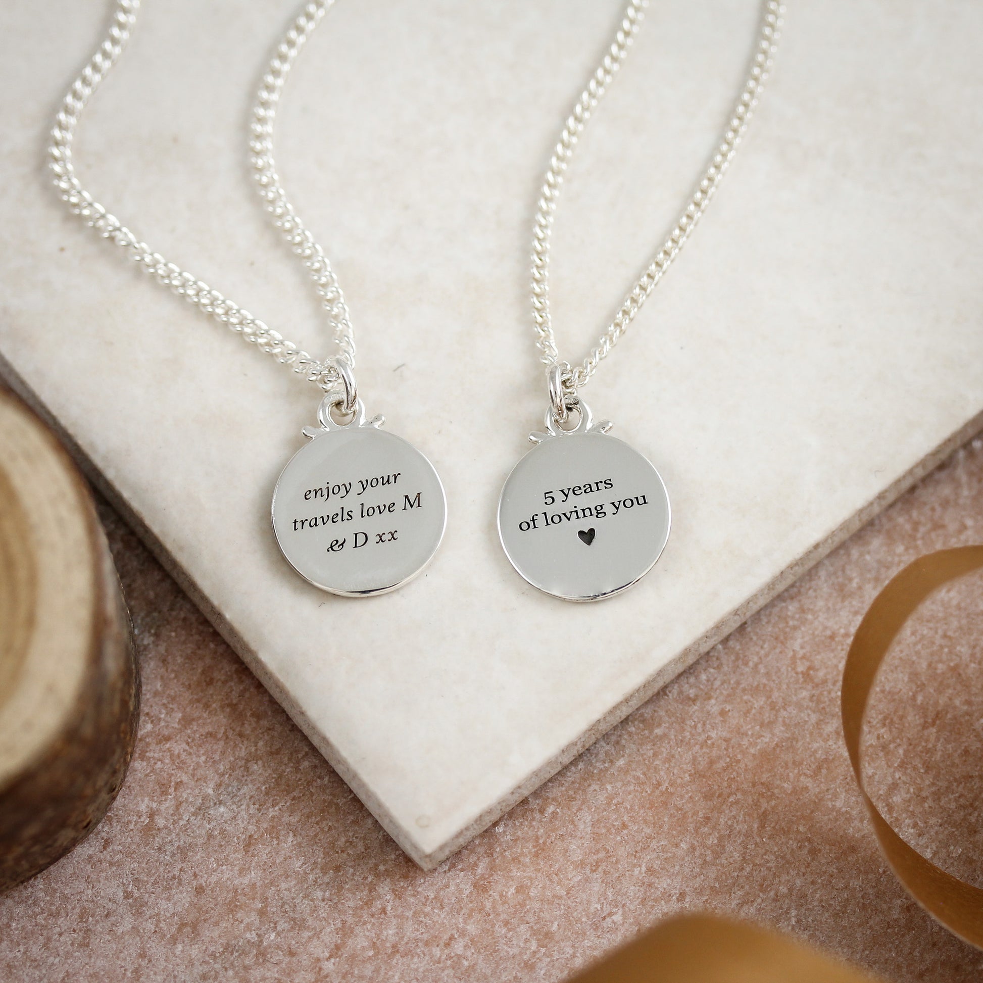 engraved silver pendants on curb chains