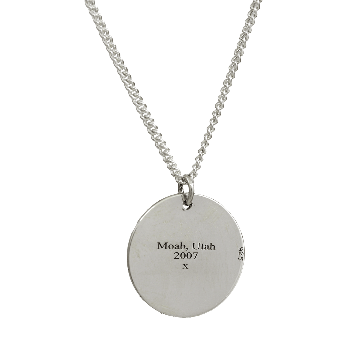 Moab 2007 engraved disc star map necklace back