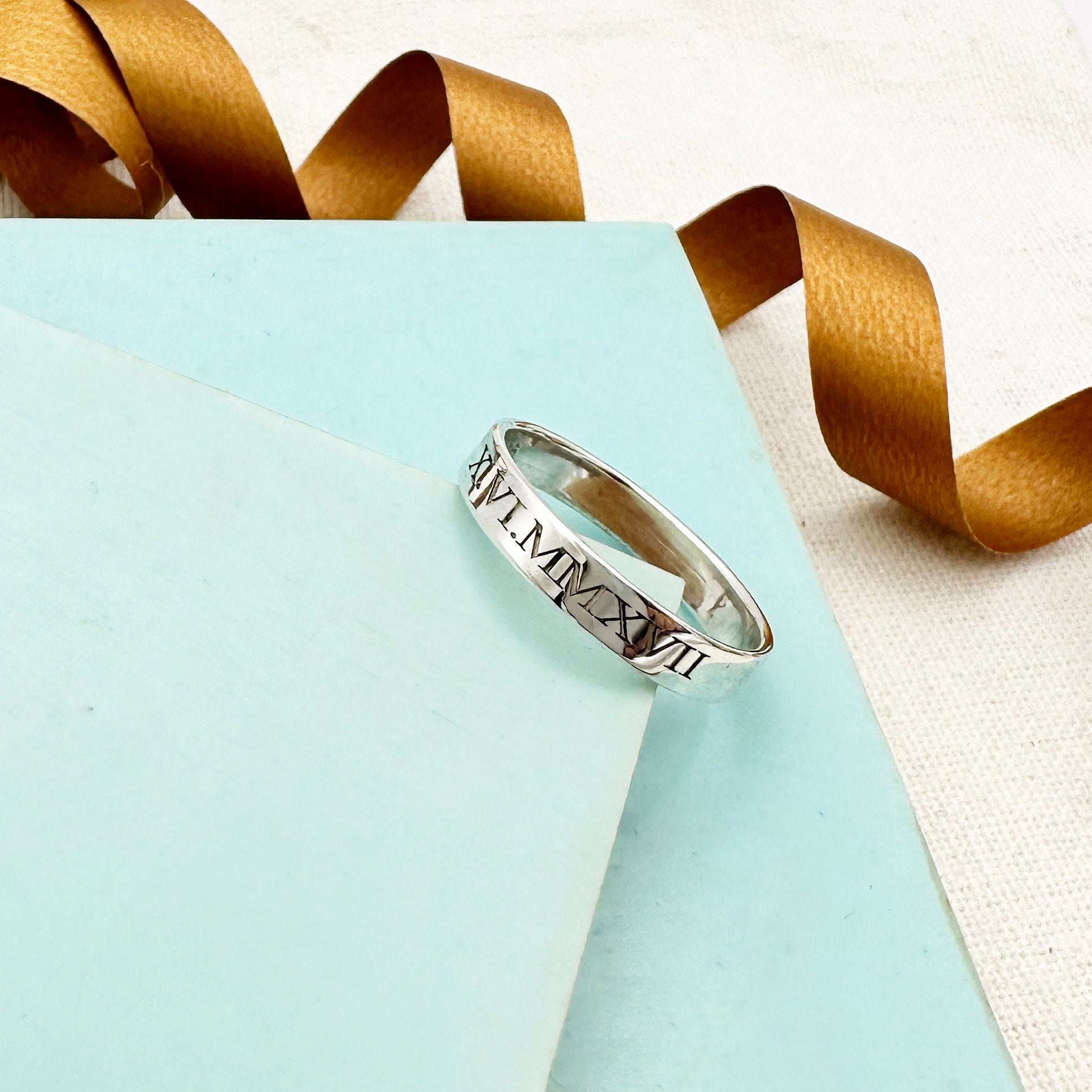 skinny roman numerals polished ring