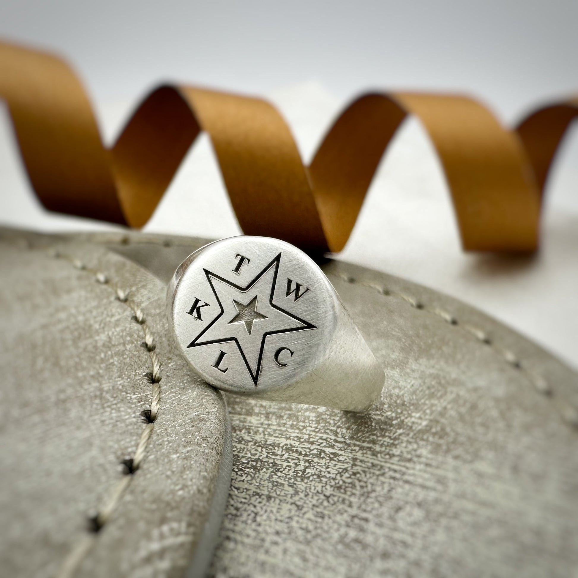 initials and star on solid silver mens pinky signet ring 
