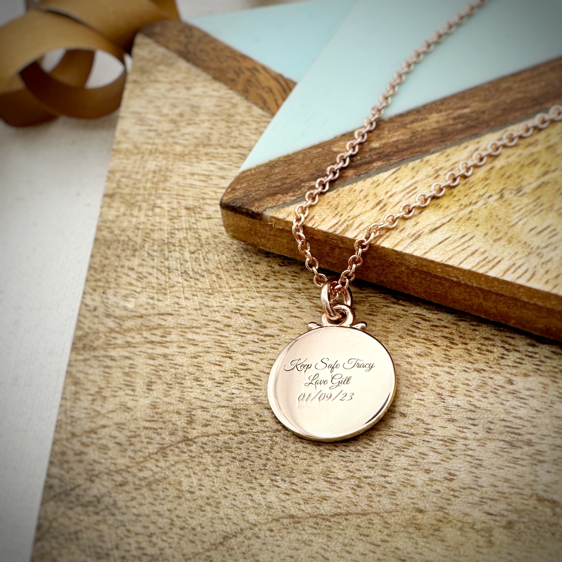 rose gold compass travel safe necklace rose gold engraved on the back