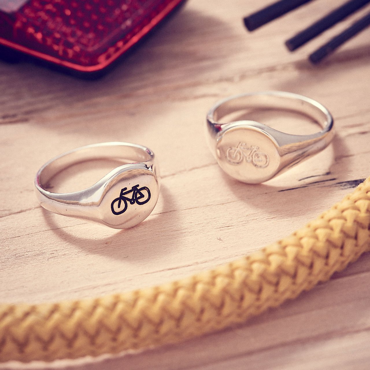 Silver Cyclist Signet Ring for men and women engraved with bike symbol from Off The Map Brighton
