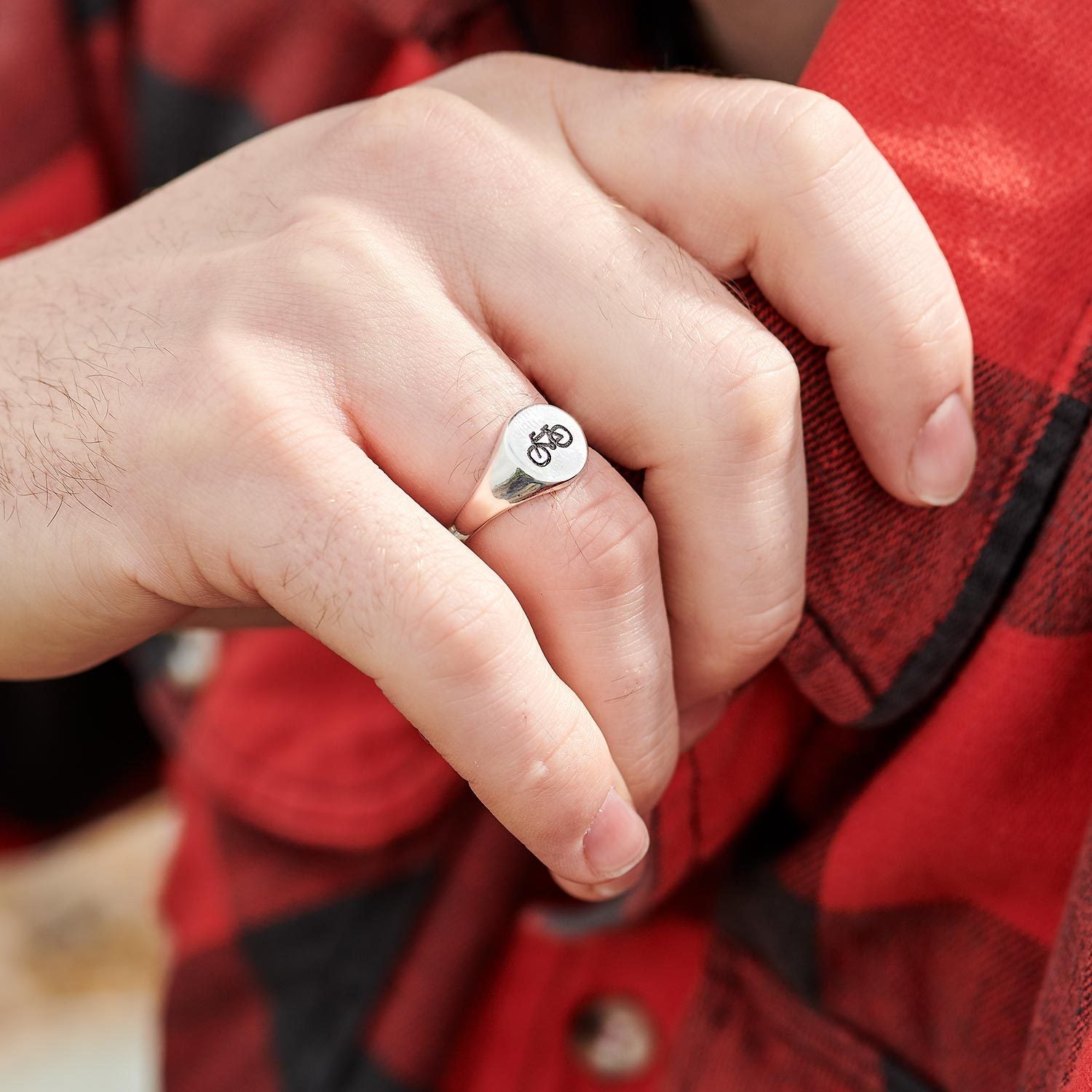 Silver Cyclist Signet Ring for men and women engraved with bike symbol from Off The Map Brighton