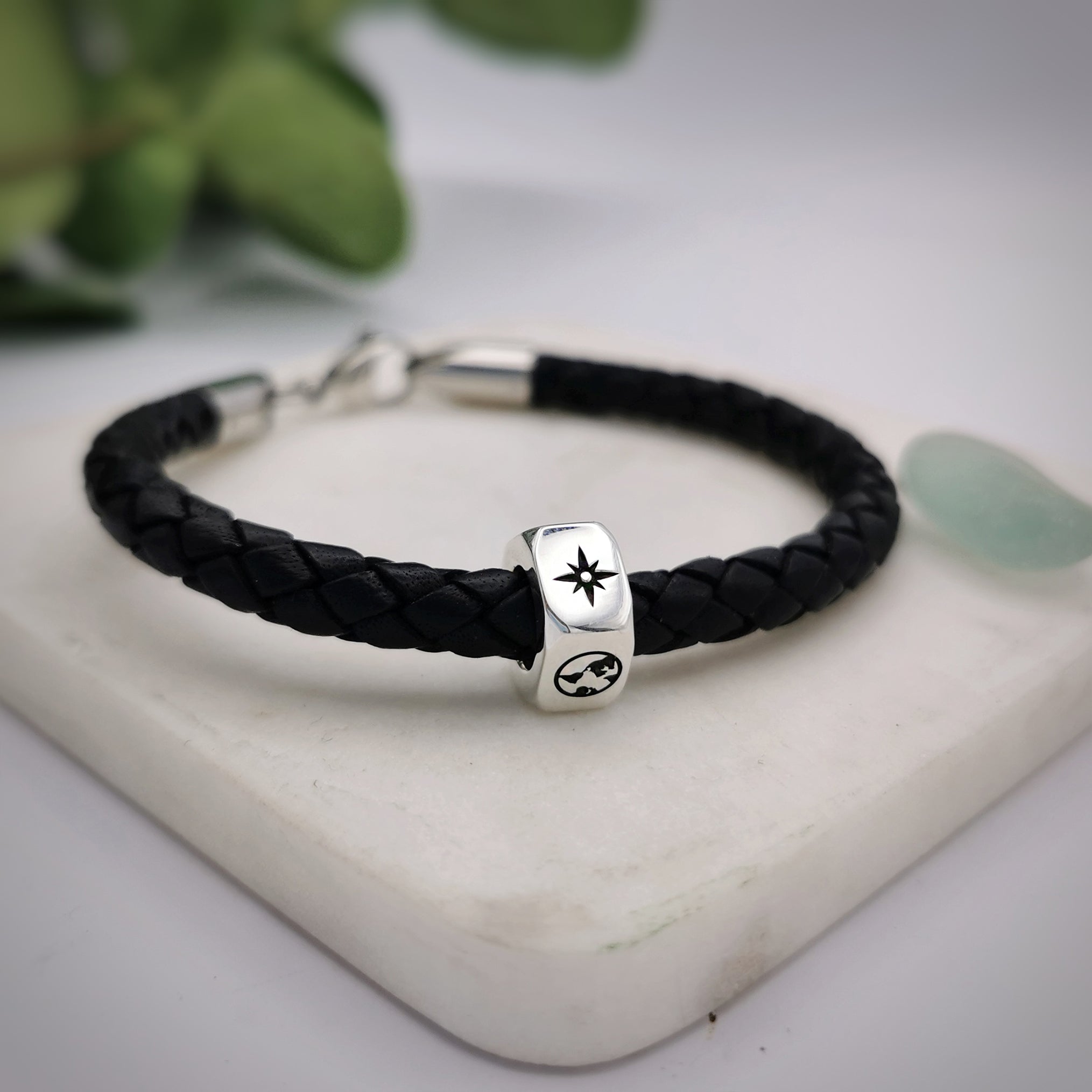 traveller charm bracelet with north star and globe engraved